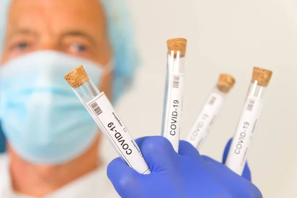 Many Covid Test Tubes Hands Doctor — Stock Photo, Image