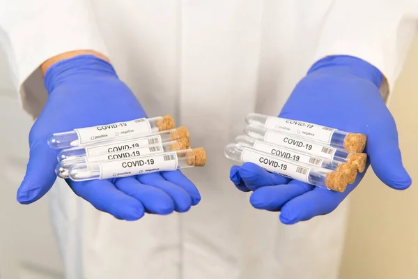 Many Covid Test Tubes Inhands Doctor — Stock Photo, Image