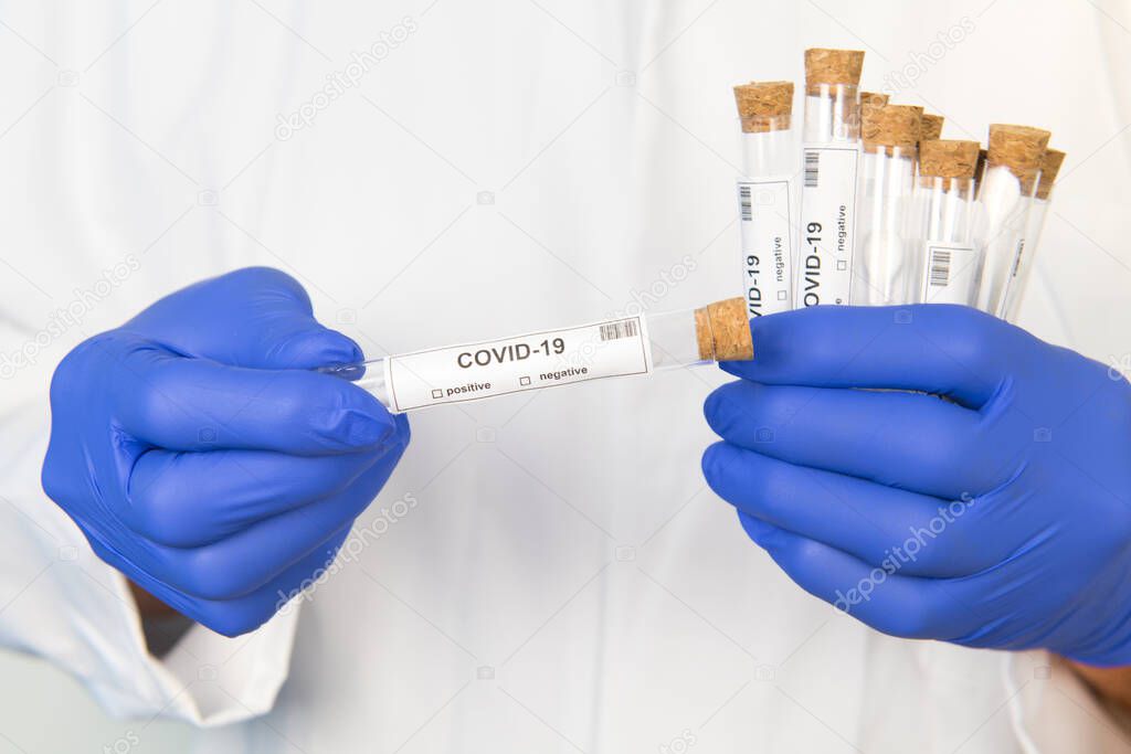 Doctor with covid-19 test set