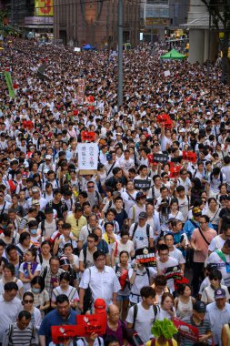 Hong Kong-9 Haziran 2019: Hong Kong 9 Haziran sokakta milyonlarca insan ile korumak.