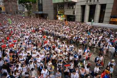 HONG KONG - June 9, 2019: Hong Kong June 9 protect with million of people on the street. clipart