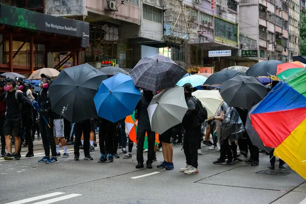 홍콩에 있는 한 섬에서는 비상사태에 항의하는 시위가 있었습니다. 로열티 프리 스톡 사진