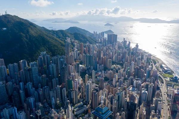 City Top View of Skyscrapers Building by drone Hong Kong city - Aerial view cityscape flying above Hong Kong City development buildings