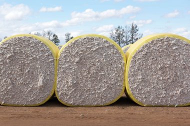 Cotton Bales on a cotton farm near Warren, in New South Wales, Australia clipart