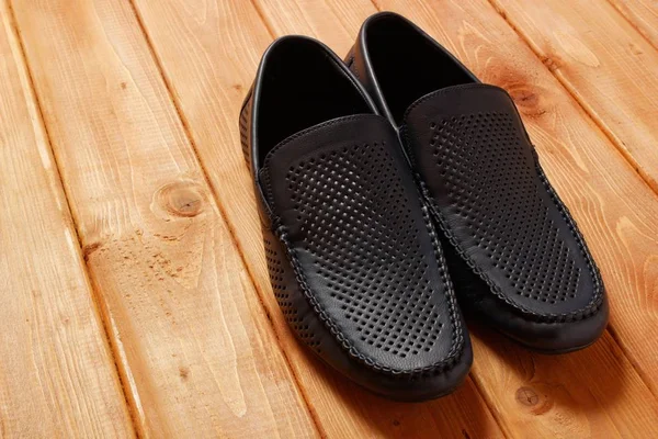 Konzept Mit Schuhen Auf Holzboden — Stockfoto