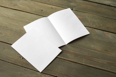 Kimlik marka için şablon. Grafik tasarımcıları sunumlar ve ahşap arka plan üzerinde izole portföyleri, mock-up, için.