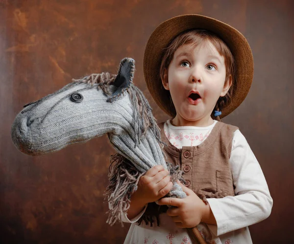 Surprised Little Girl Dressed Cowboy Playing Homemade Horse Expressive Facial — Stock Photo, Image