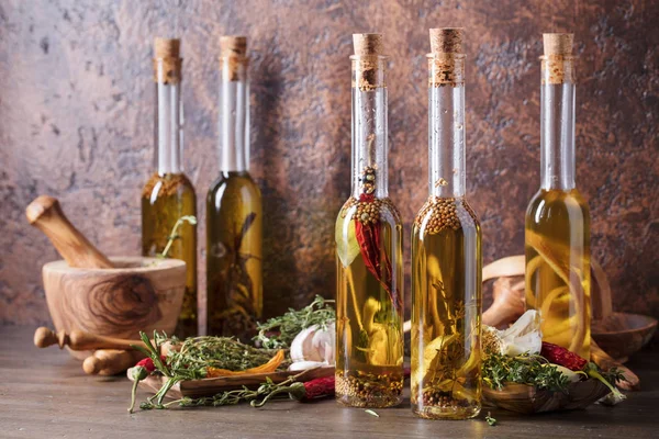 Bottles Olive Oil Old Wooden Table Olive Oil Different Spices — Stock Photo, Image