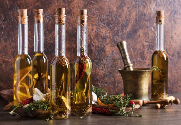 Bottles Olive Oil Old Wooden Table Olive Oil Different Spices — Stock Photo, Image