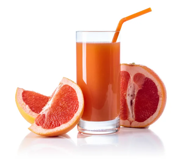 Glass of fresh grapefruit juice and cut fruits isolated on a white background.