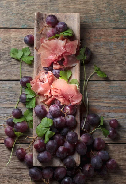 Prosciutto Parsley Grapes Old Wooden Table Top View — Stock Photo, Image