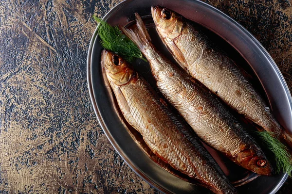 Smoked herring with dill on a metal dish. Copy space for your text. — Stock Image Smoked Herring Dill Metal Dish Copy Space Your Text Stock Picture
