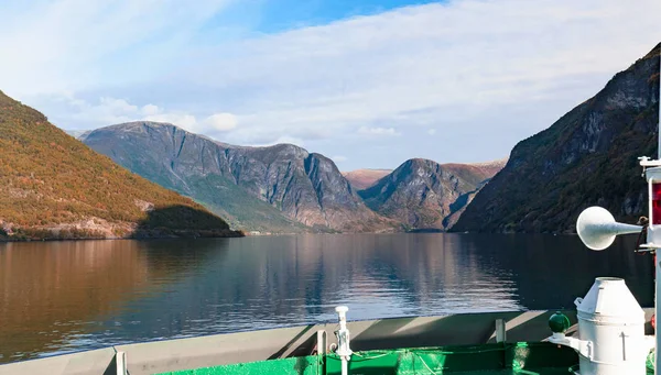 Scenic landscapes of the northern Norwegian fjords. Beautiful view of the coast of Sognefjord on a september day. The view from the cruise ship.