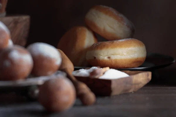 Sweet Donuts Cinnamon Sticks Powdered Sugar Old Wooden Table Selective — Stock Photo, Image