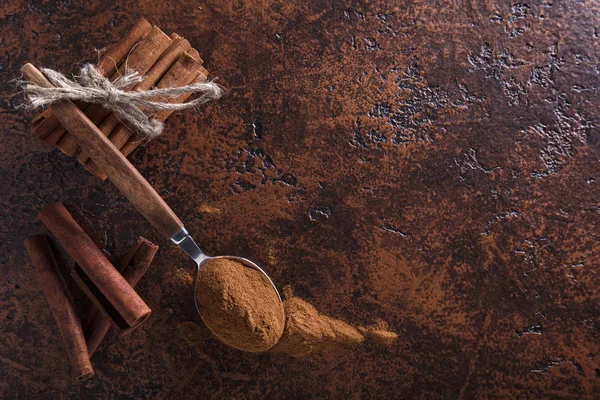 Cinnamon Sticks Powder Spoon Old Copper Table Copy Space Top — Stock Photo, Image