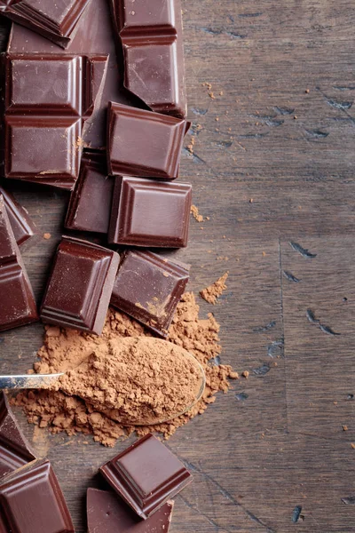 Chocolate Pieces Cocoa Powder Small Spoon Old Wooden Background Top — Stock Photo, Image