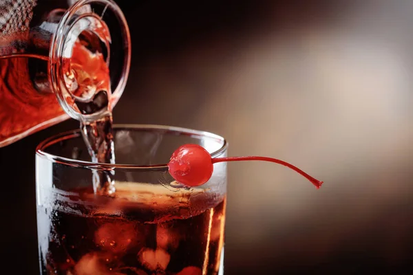 Whiskey Poured Carafe Glass Ice Cocktail Manhattan Cherry Copy Space — Stock Photo, Image