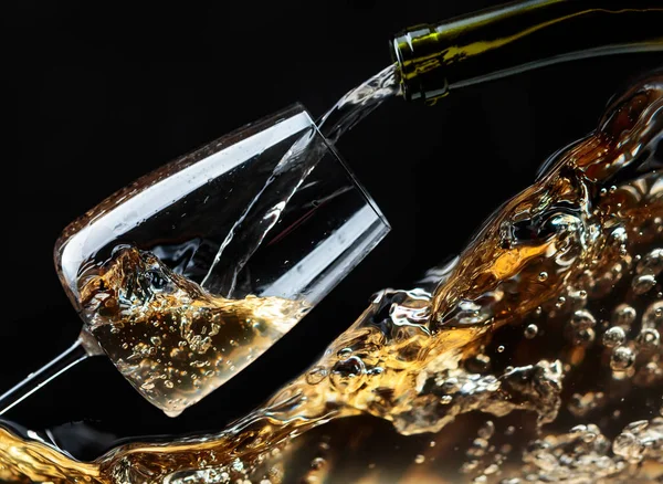 White Wine Being Poured Wineglass Black Background — Stock Photo, Image