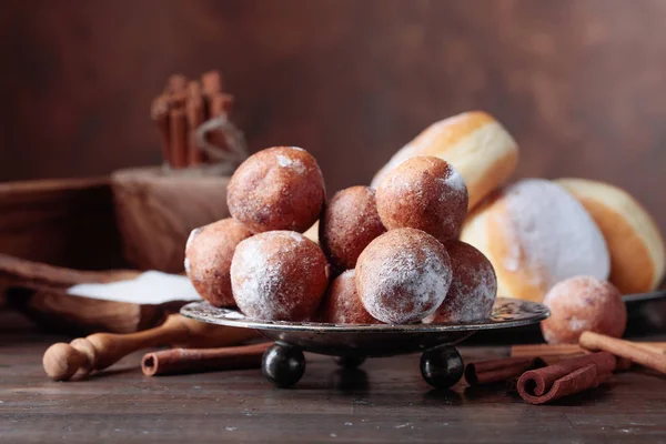 Sweet Donuts Cinnamon Sticks Powdered Sugar Old Wooden Table — Stock Photo, Image