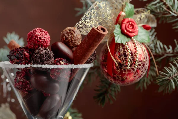 Assortment Fine Chocolate Candies Goblet Christmas Decoration Cinnamon Sticks Chocolate — Stock Photo, Image