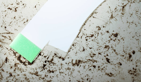 Sponge on a dirty glass. Copy space for your text.