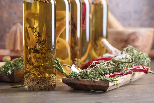 Bottles Olive Oil Old Wooden Table Olive Oil Different Spices — Stock Photo, Image