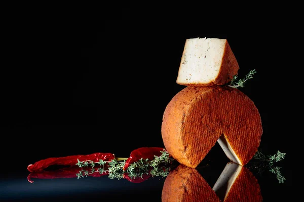 Sheep milk cheese with red pepper. — Stock Photo, Image