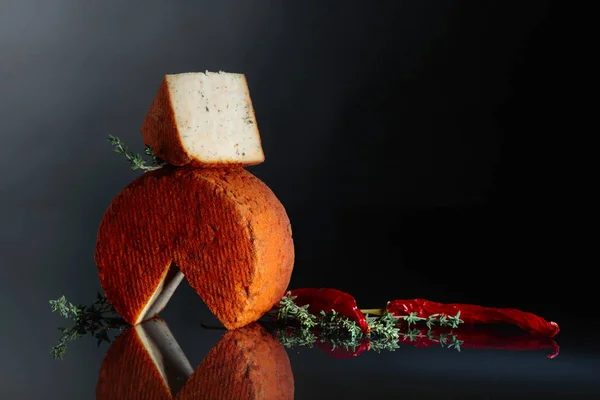 Cheese with thyme and red pepper. — Stock Photo, Image