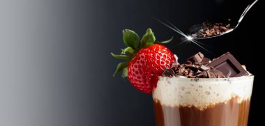 Chocolate drink with whipped cream, strawberry and pieces of bla clipart