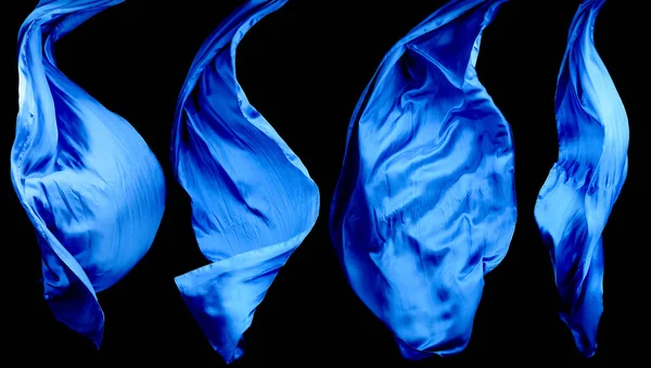 Гладка елегантна блакитна прозора тканина ізольована на чорному фоні — стокове фото
