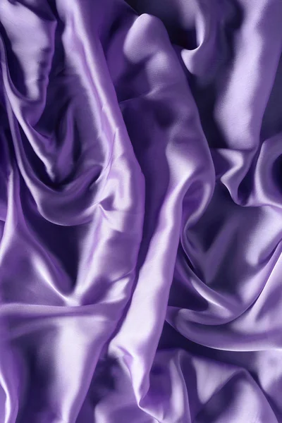 Silk satin tyg textur bakgrund. — Stockfoto