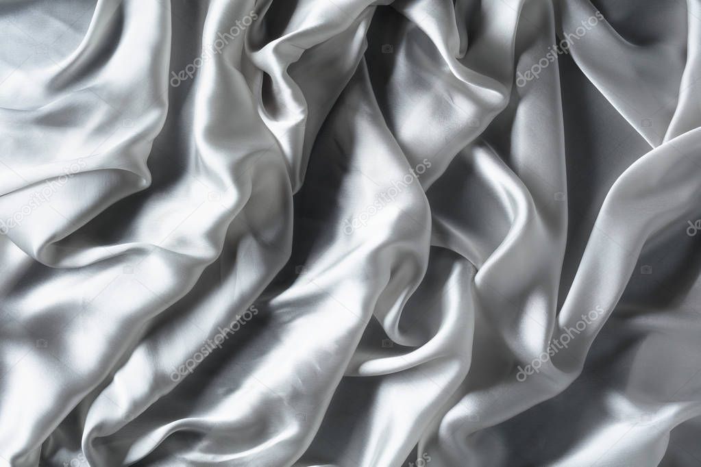 Silk satin fabric texture background.