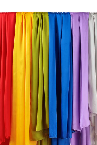 Vertical colorful satin curtains isolated on white. — Stock Photo, Image