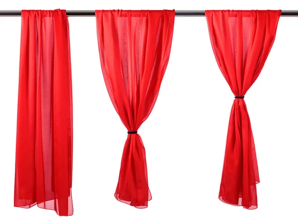 Cortinas de cetim vermelho verticais isoladas em branco . — Fotografia de Stock