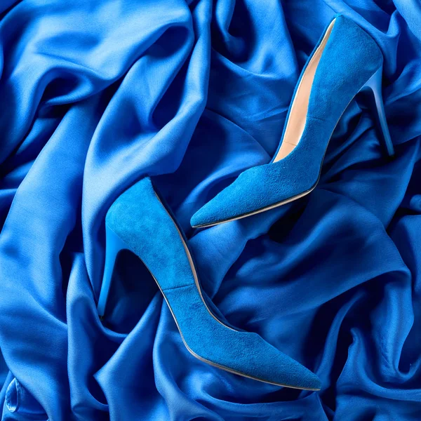 Blue women's corduroy shoes on a silk background. — Stock Photo, Image