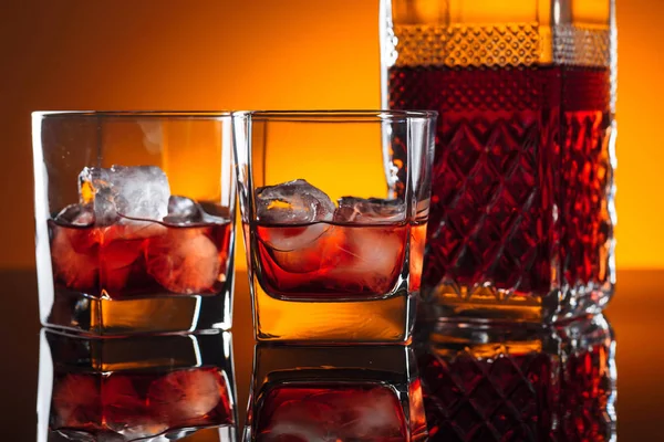 Glasses of whiskey with ice. — Stock Photo, Image