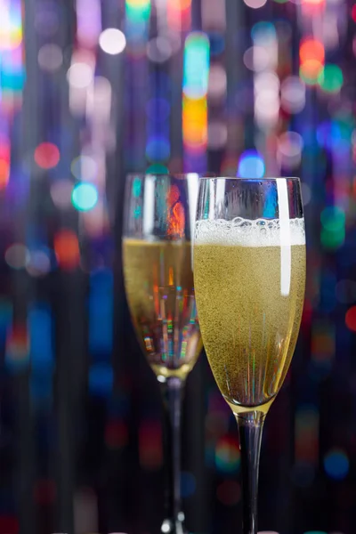 Champagne glasses on lights background. Christmas and New Year h — ストック写真