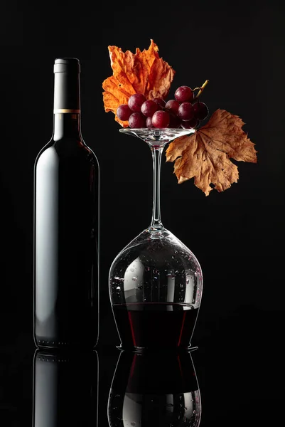 Bottle Red Wine Inverted Wine Glass Wine Black Background Wine — Stock Photo, Image