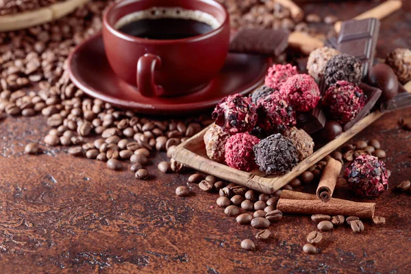 Various Chocolates Cup Black Coffee Sweets Cinnamon Sticks Coffee Beans — Stock Photo, Image