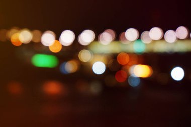 Arka plan çok renkli parlak ışıkların. Gece şehir ışık görüntü.