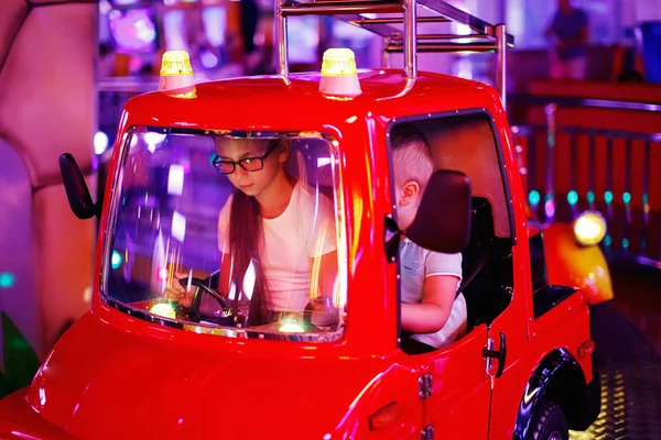 Cute Teen Girl Little Boy Riding Carousel Toy Car Arcade — Stock Photo, Image
