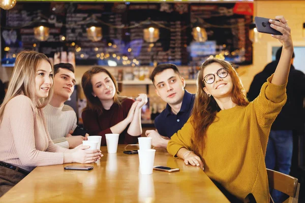 Five young handsome students sitting in a cafe. — Stock Photo, Image