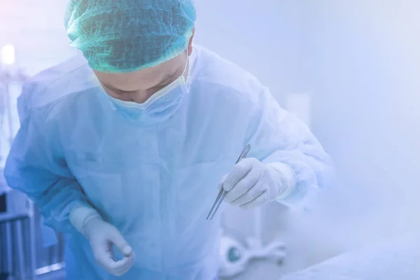 Team of surgeons doing surgery — Stock Photo, Image