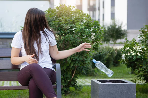 Woman and garbage