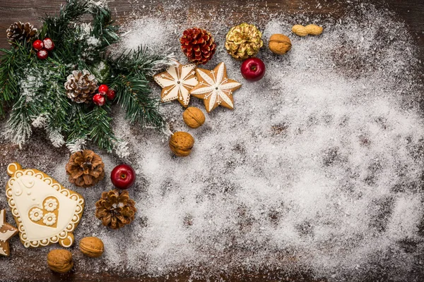 Weihnachtlicher Hintergrund Mit Zweig Und Lebkuchen — Stockfoto