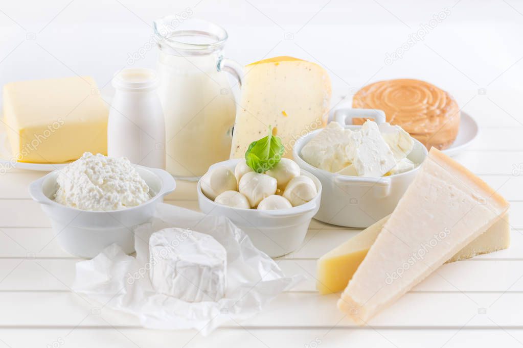 Variation of dairy products on white background