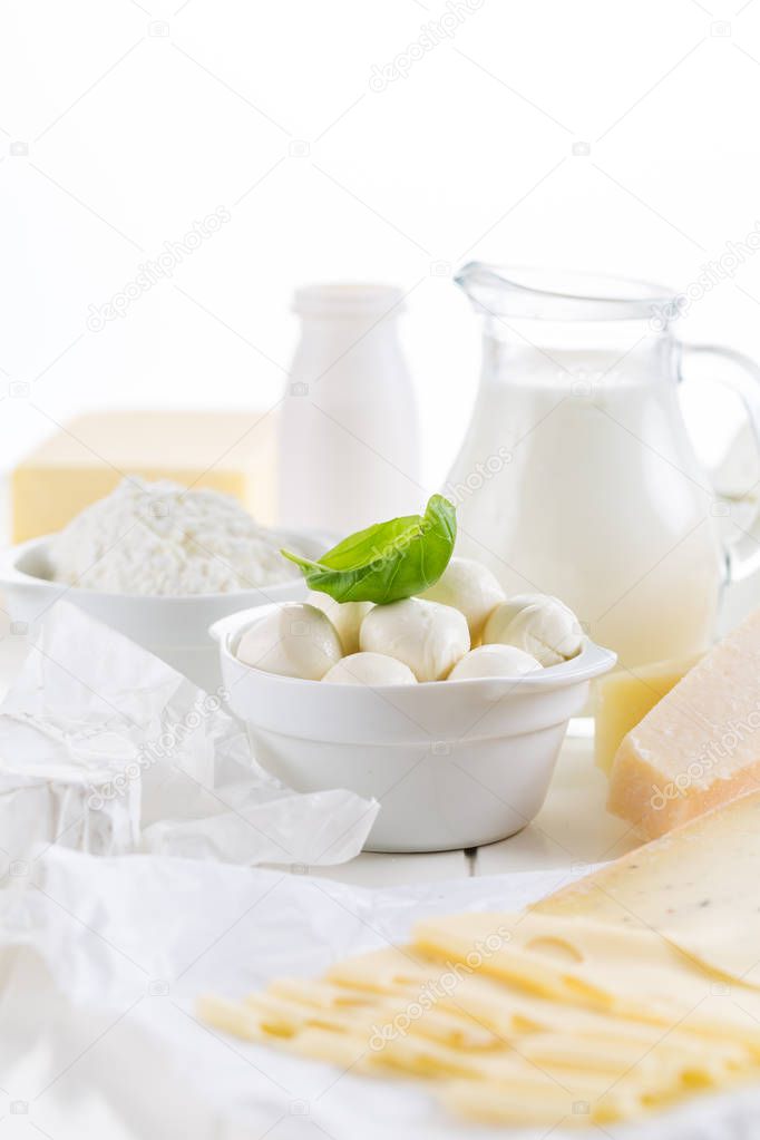 Variation of dairy products on white background