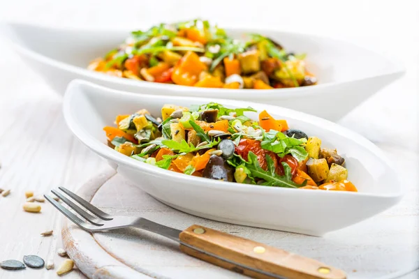 Mixed Salad Roasted Vegetables Arugula Seeds Wooden Background — Stock Photo, Image