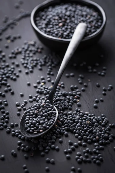 Beluga Lentils Black Background Black Lentils Bowl Spoon — Stock Photo, Image