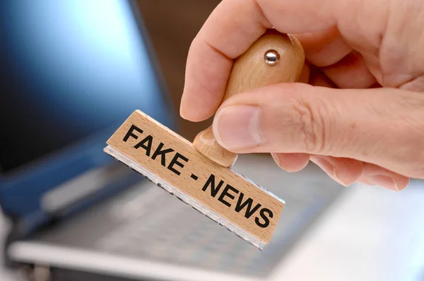 Fake News Printed Rubber Stamp Hand — Stock Photo, Image